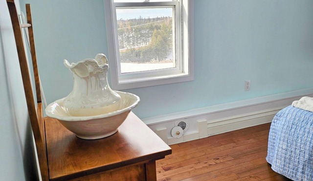 Whispering Meadows Manor is a 4 bedroom 1.5 bath country home