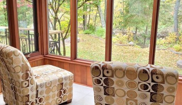 Whispering Pines Riverside Getaway