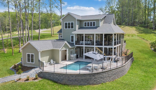 Whispering Pines Estate, Waterfront Luxury w/Covered Verandas + Heated Salt Pool, Hot Tub, Dock!
