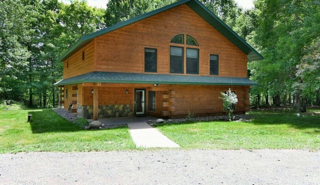 Whispering Waters Lodge with Waterfall, Pond and Trails on Property in Delta, WI