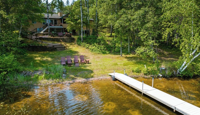 Whispering Woods- Spacious 5 bedroom home with sandy frontage near Spooner, WI.