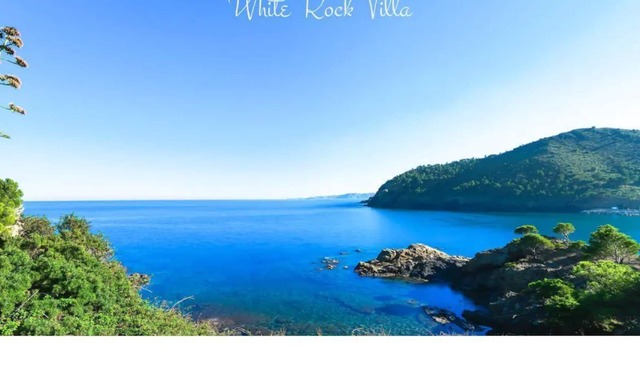 White rock villa with breathtaking views and pool