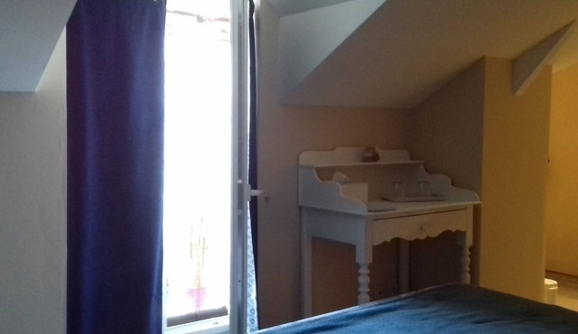 White room with private shower room and WC