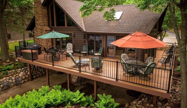 Whitefish Chain Lake Home with Beach + Sauna + King Beds + Kayaks +Paddle Boards