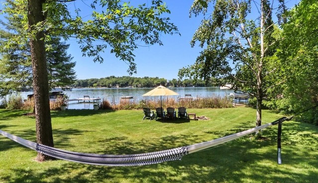 Whitewater Lakefront Lodge with 200 Feet Shoreline Docks Sunset Views