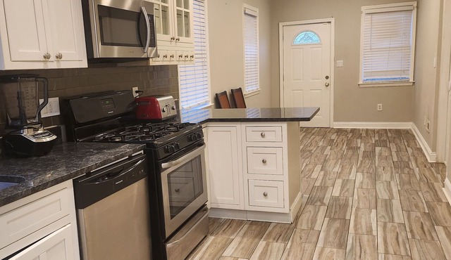 whole 3-bedroom townhome in welcoming Baltimore with AC and charm