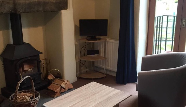 Wicket Green cottage. Central village location overlooking the river