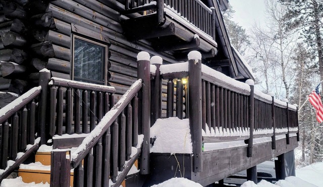 Wilderness Log Home on the River Ely Lakes Fish Hike Ski Snowmobiling ATV Pets