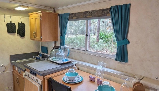 WildNest – Cozy Pop-up Camper in Nature