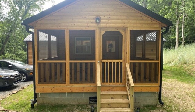 Winding road cabin screen front porch uncovered back porch