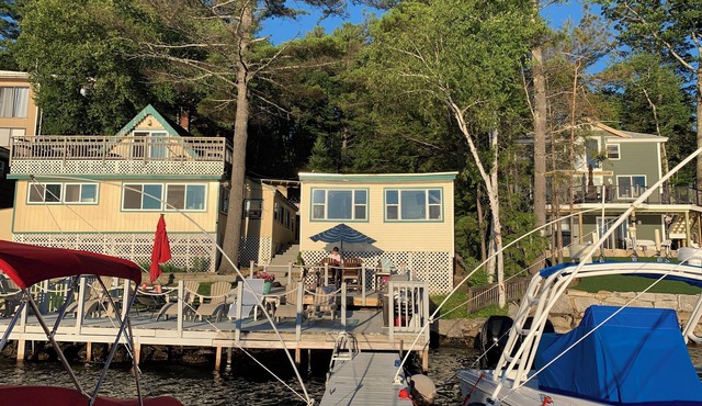 Winnipesaukee waterfront family compound with 40 foot dock and amazing sunsets!