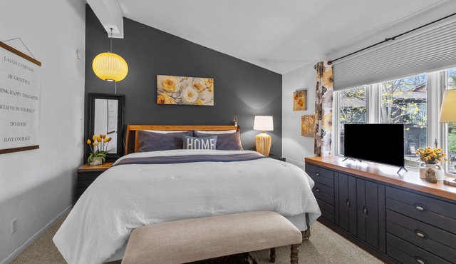 Winter getaway with cozy fireplace in this Elegant Lake Geneva condo & King bed.