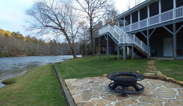 Winter in the mountains, fishing by the fire pit. Murphy and the Casino nearby.