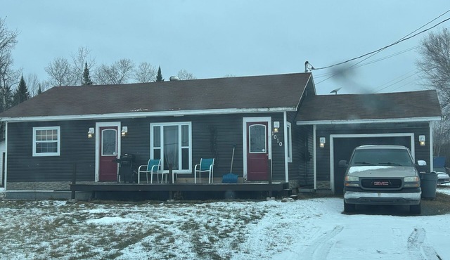 With a view of the famous Miramichi River.Come stay at Poppy Jacks place.