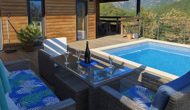 WOODEN HOUSE WITH PEACEFUL POOL