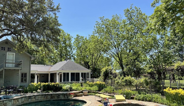 Wonderful Cottage located on three acres. Overlooks garden, pool and hot tub.