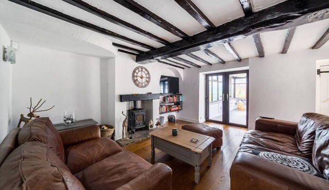 Wood burner, two lounges and a large garden for up to 8 guests