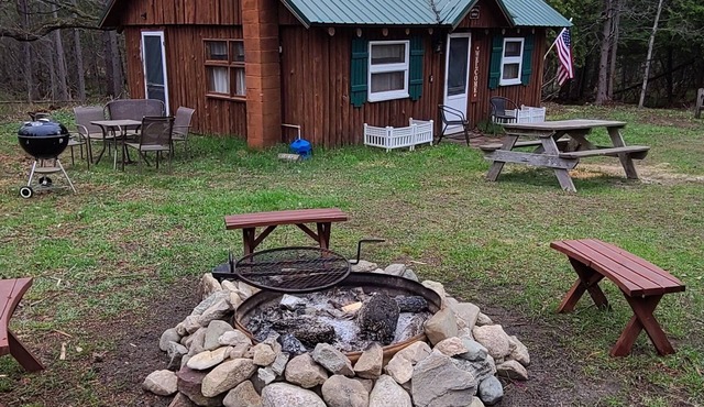Wood Haven Lodge. Secluded, cozy log cabin in Northern Michigan.