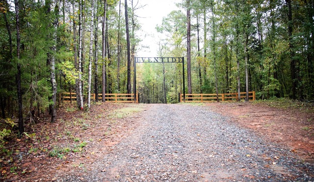 Wooded 83-Acre Estate with 4-bedroom Home, Pond, Creek, and Walking Trails