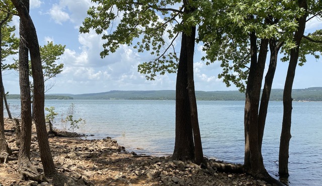 Wooded Bliss on 1 acre with lake access across the street and sleeps up to 10!