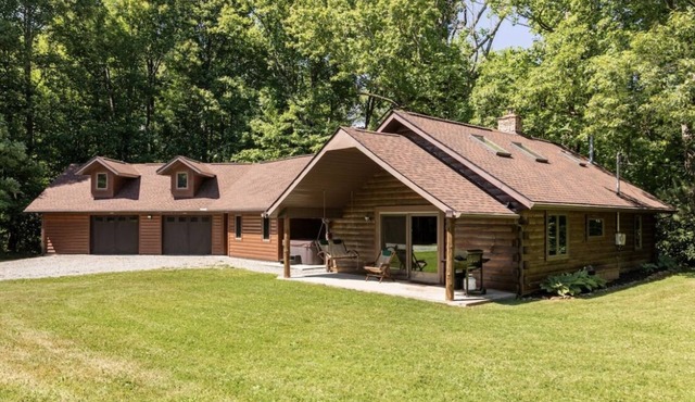 Wooded cabin in the Laurel Highlands with beautiful yard and native trout stream