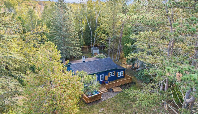 Wooded Retreat across from Lake MI