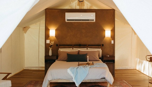 Wooded retreat space with glamping tents, container homes & tons of amenities!