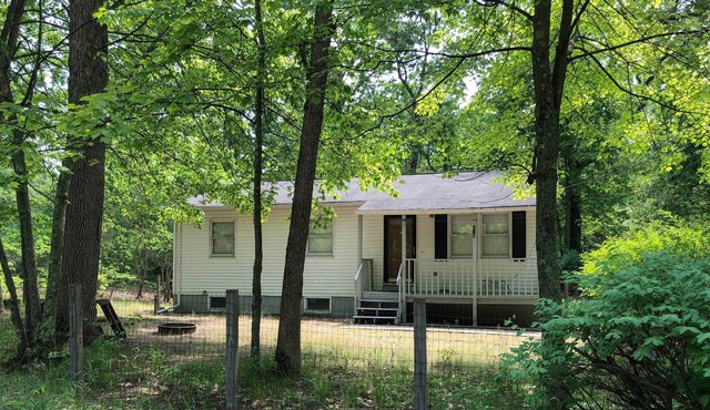 Wooded Twin Lakes Retreat: 13 Mi to Lake Michigan!