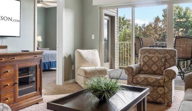 Wooded View 2-Bedroom Condo with Deck, Free Tickets & Close to State Park Marina