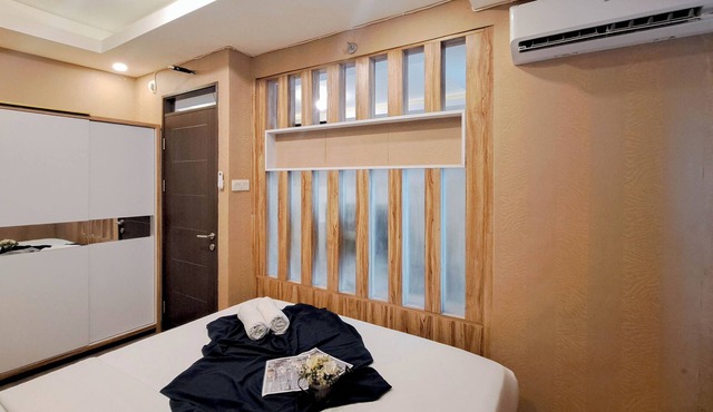 Wooden Accent 2Br At Mekarwangi Square Cibaduyut Apartment