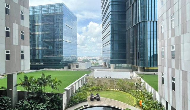 Wooden Accents 1Br At Podomoro City Deli Medan Apartment