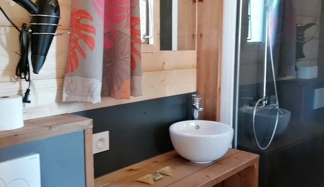 Wooden bungalow in the countryside on a multi-family estate