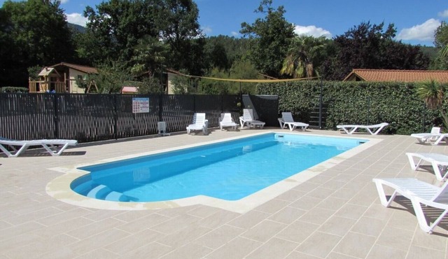 Wooden chalets in gite village with terrace, barbecue, swimming pool and air conditioning