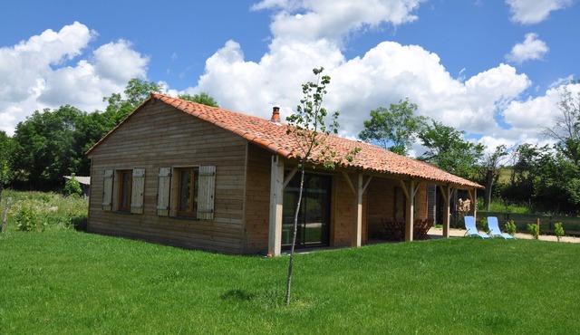 Wooden chalet house on enclosed land