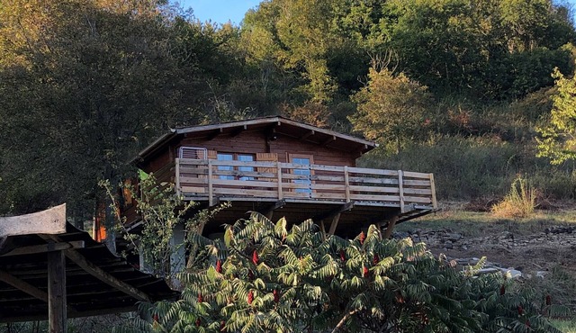 Wooden chalet in the heart of nature near a farm