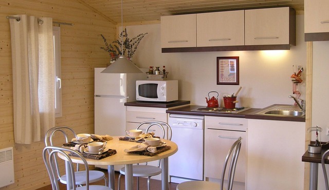 Wooden chalet on the edge of a lake