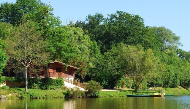 Wooden cottage on the water