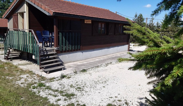 Wooden cottage in the countryside