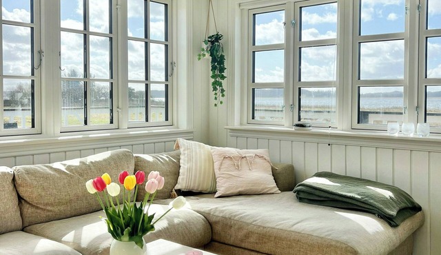 Wooden cottage with open view to Sebbersund fjord