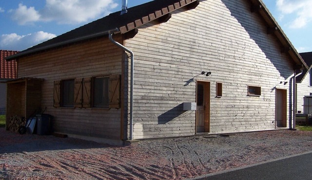 Wooden house with cinema room in the countryside