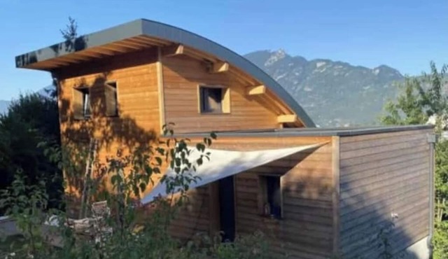 Wooden haven of peace with pre-Alps panorama