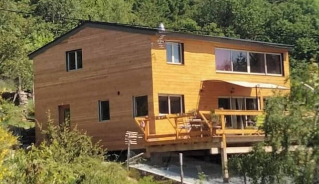 Wooden house in the heart of nature
