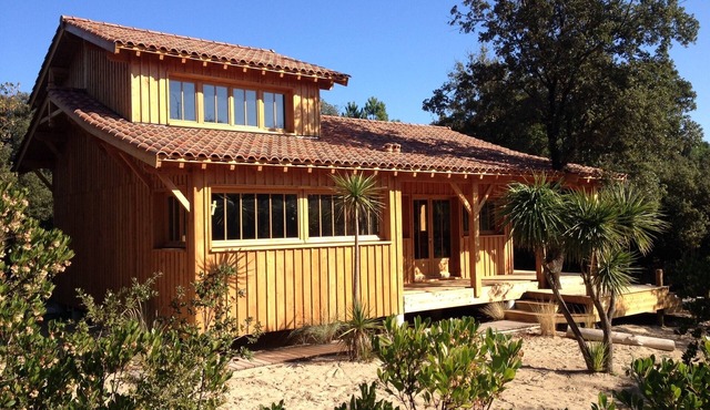 WOODEN HOUSE IN THE BORDER OF THE OCEAN
