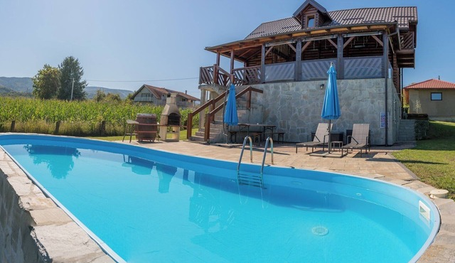 Wooden house in Zagorje with jacuzzi, pool, barbecue, and kids’ playground