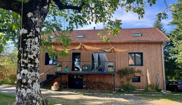 Wooden house in the heart of nature