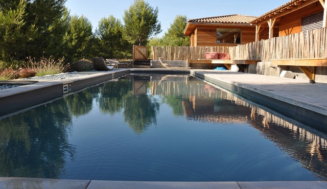 Wooden Houses Near Aix-en-Provence garden pool welcoming 12 to 16 people