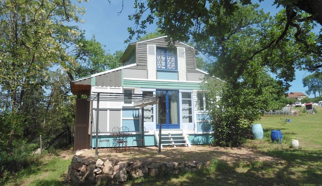wooden squirrel hut under the oaks at the edge of the wood