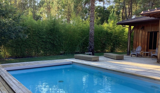 Wooden villa with heated pool-terrace and enclosed garden