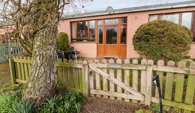 WOODPECKER, pet friendly, with open fire in High Head Castle Farm