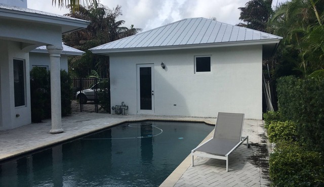 Wow! Key West Style 4 bedrooms 3 bathrooms, heated pool, downtown, walk to beach,